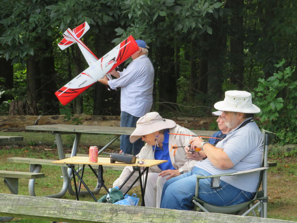 Club members in front of picnic tables